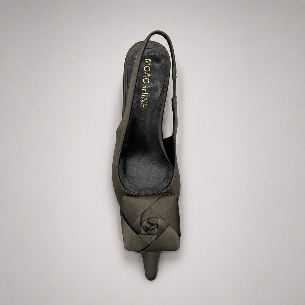Gray slingback pump outsole view showing the cow leather outsole
