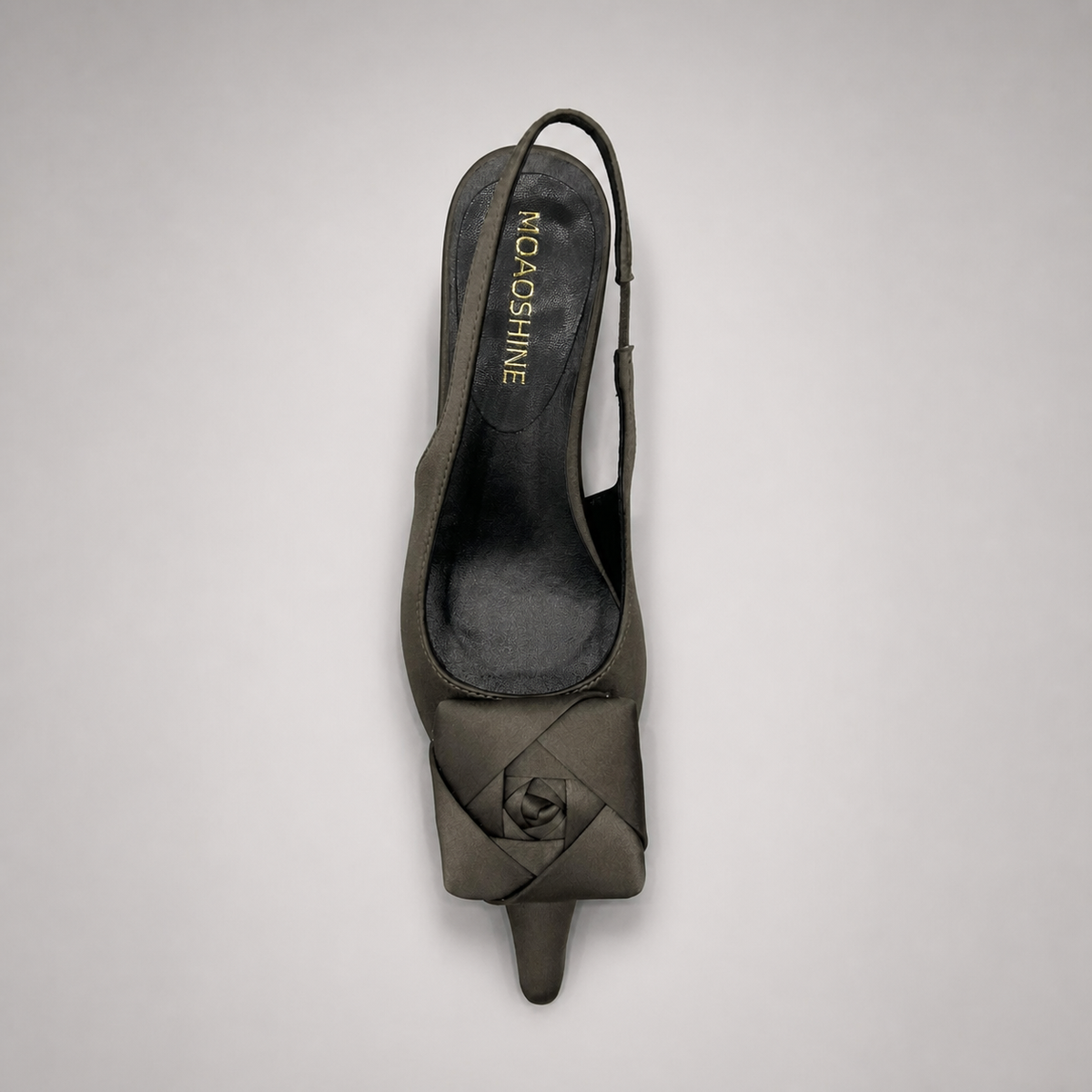 Gray slingback pump outsole view showing the cow leather outsole