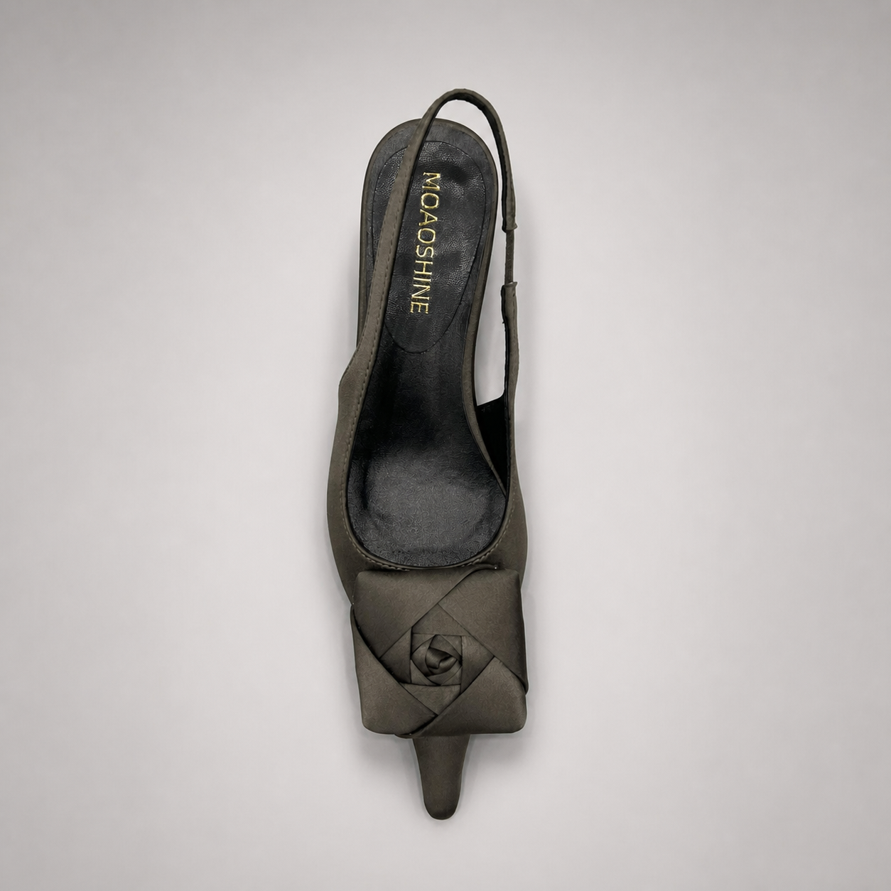 Gray slingback pump outsole view showing the cow leather outsole