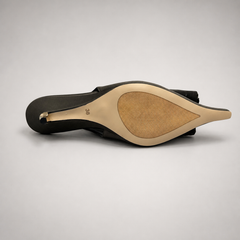Gray slingback pump top view showing a pointed toe and bow detail