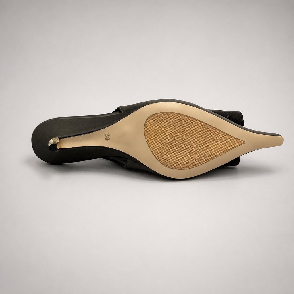 Gray slingback pump top view showing a pointed toe and bow detail