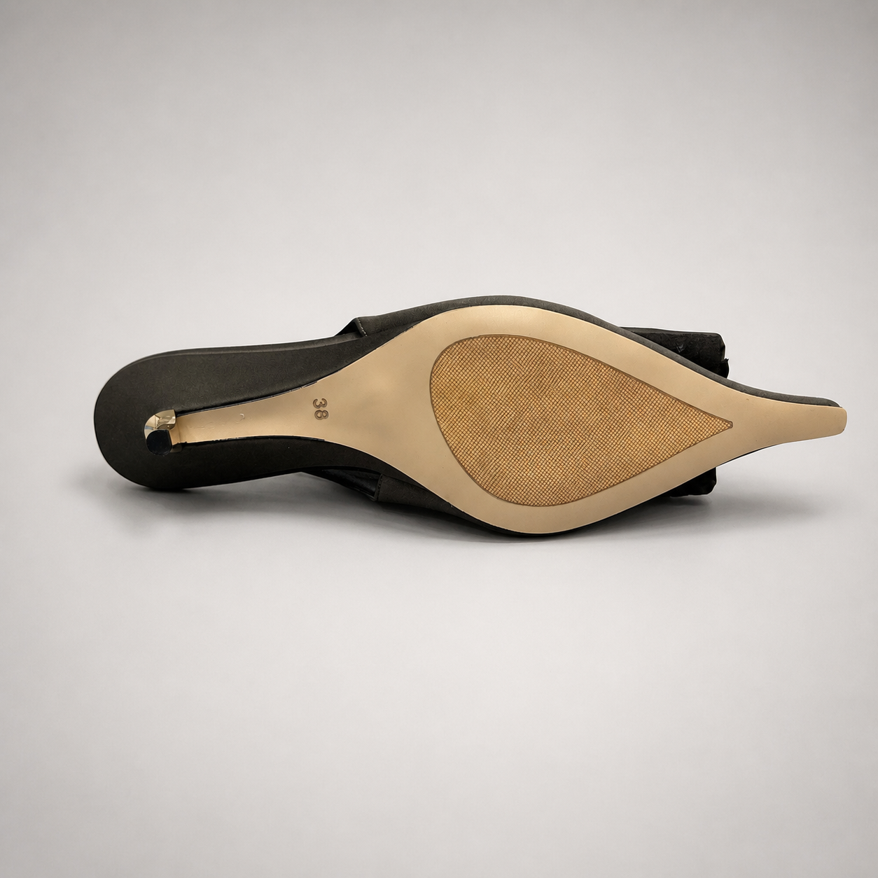Gray slingback pump top view showing a pointed toe and bow detail