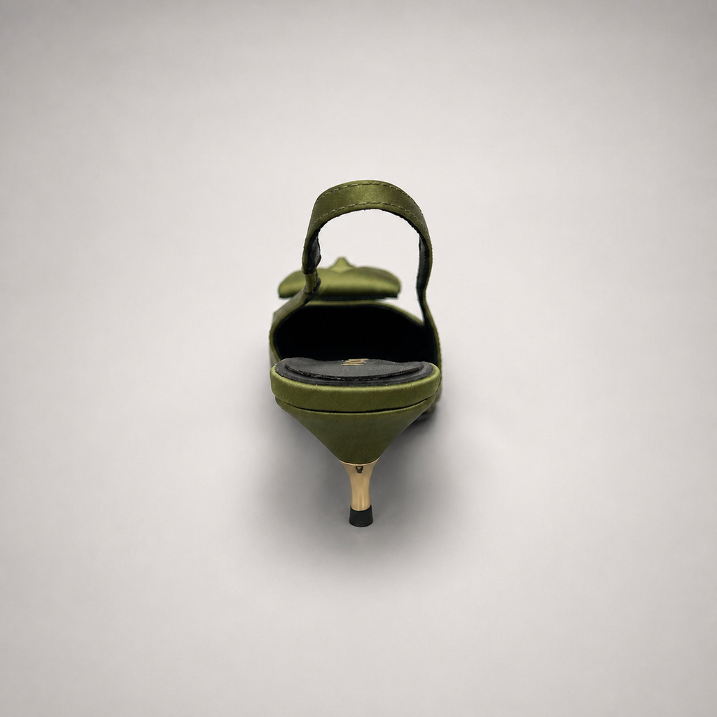 Olive slingback pump rear view showing a pointed toe and bow detail