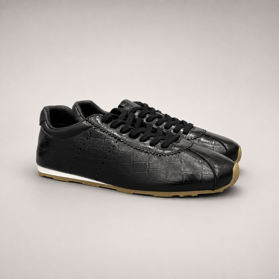 Black Sneakers pair three-quarter view