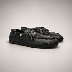 Black boat shoe pair three-quarter view