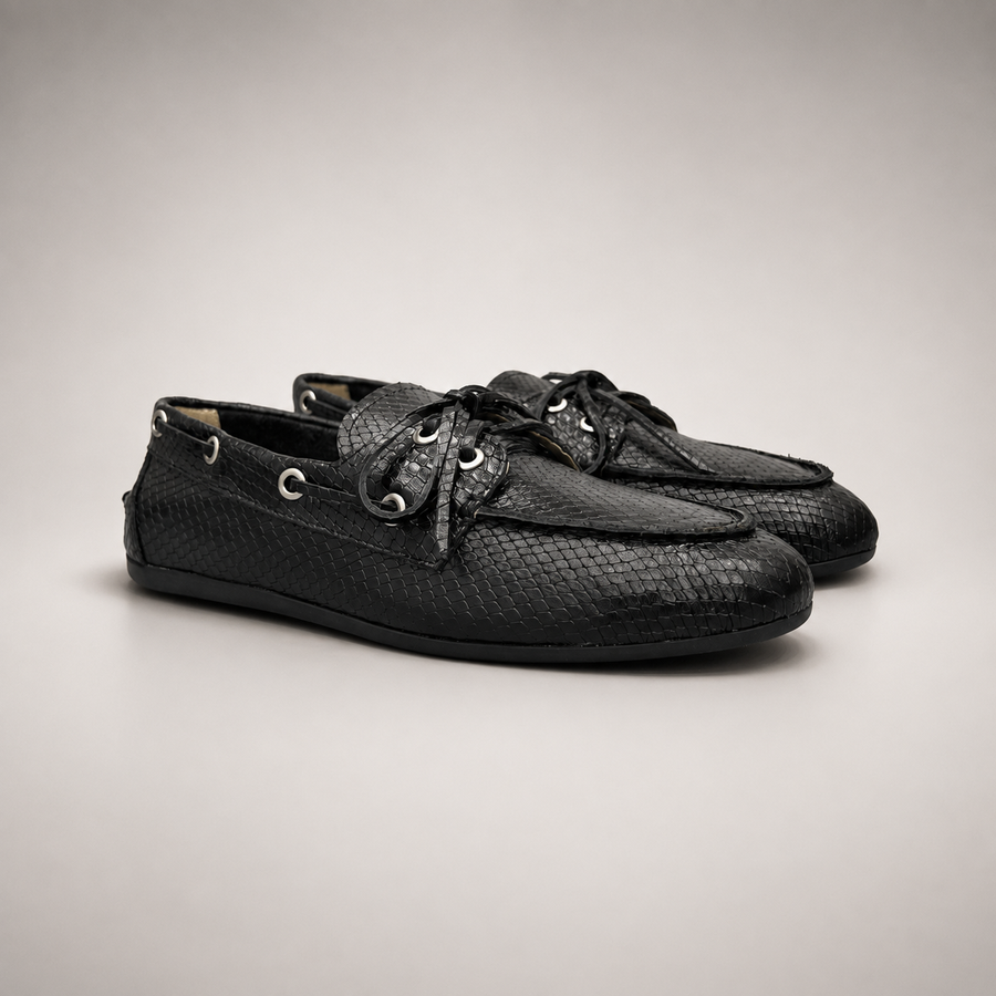 Black boat shoe pair three-quarter view