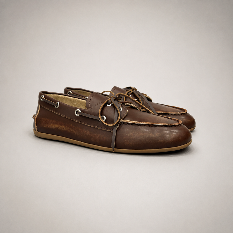 Brown boat shoe pair three-quarter view