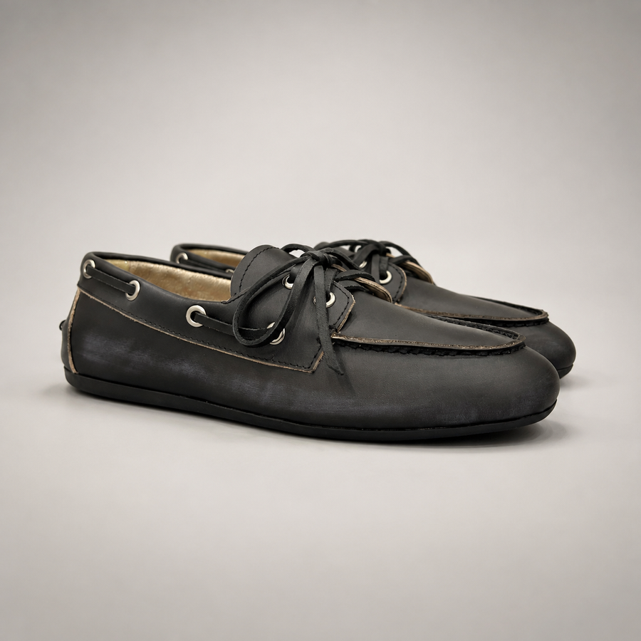 Black boat shoe pair three-quarter view