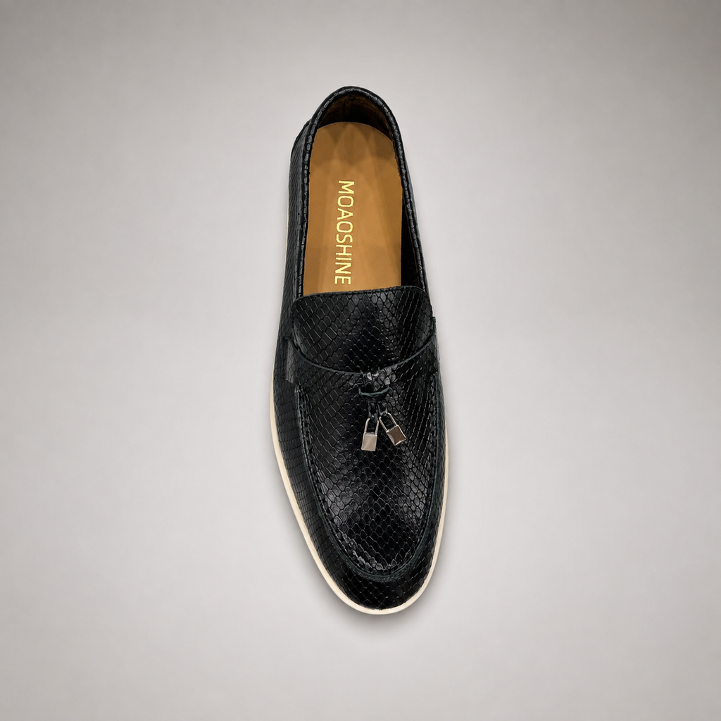 Black loafer outsole view showing the rubber outsole