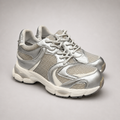 Silver sneaker pair three-quarter view showing a panelled lace-up upper