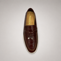 Brown loafer top view showing a crocodile-pattern embossed upper and vamp strap