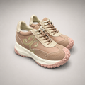 Pink sneaker pair three-quarter view showing a panelled lace-up upper