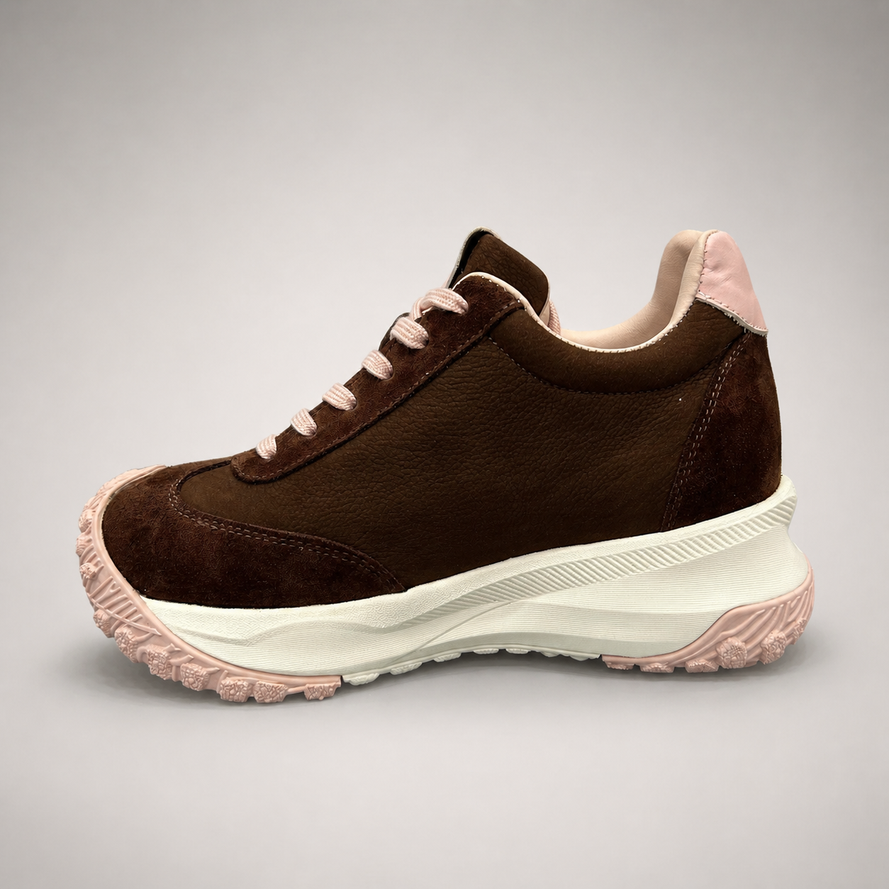Dark Brown sneaker opposite side profile showing a panelled lace-up upper