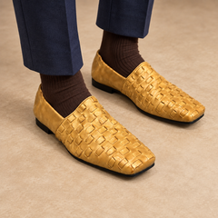 Gold washed horse leather woven loafers worn with navy trousers and brown socks