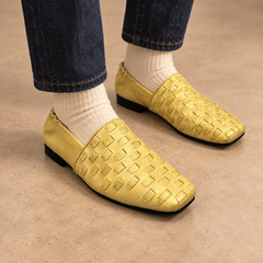 Yellow washed horse leather woven loafers worn with dark denim and cream socks